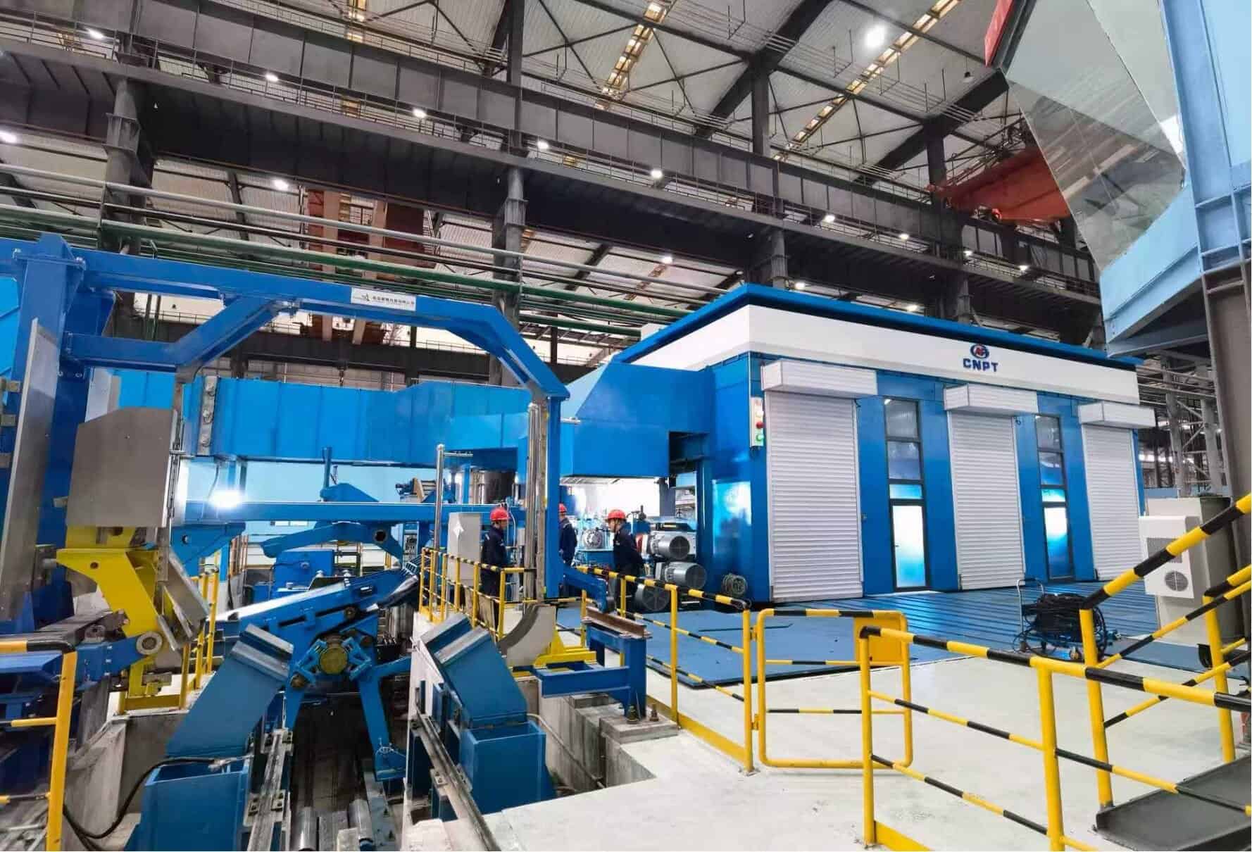 Industrial metal processing equipment at Beijing Metals-Tech factory.