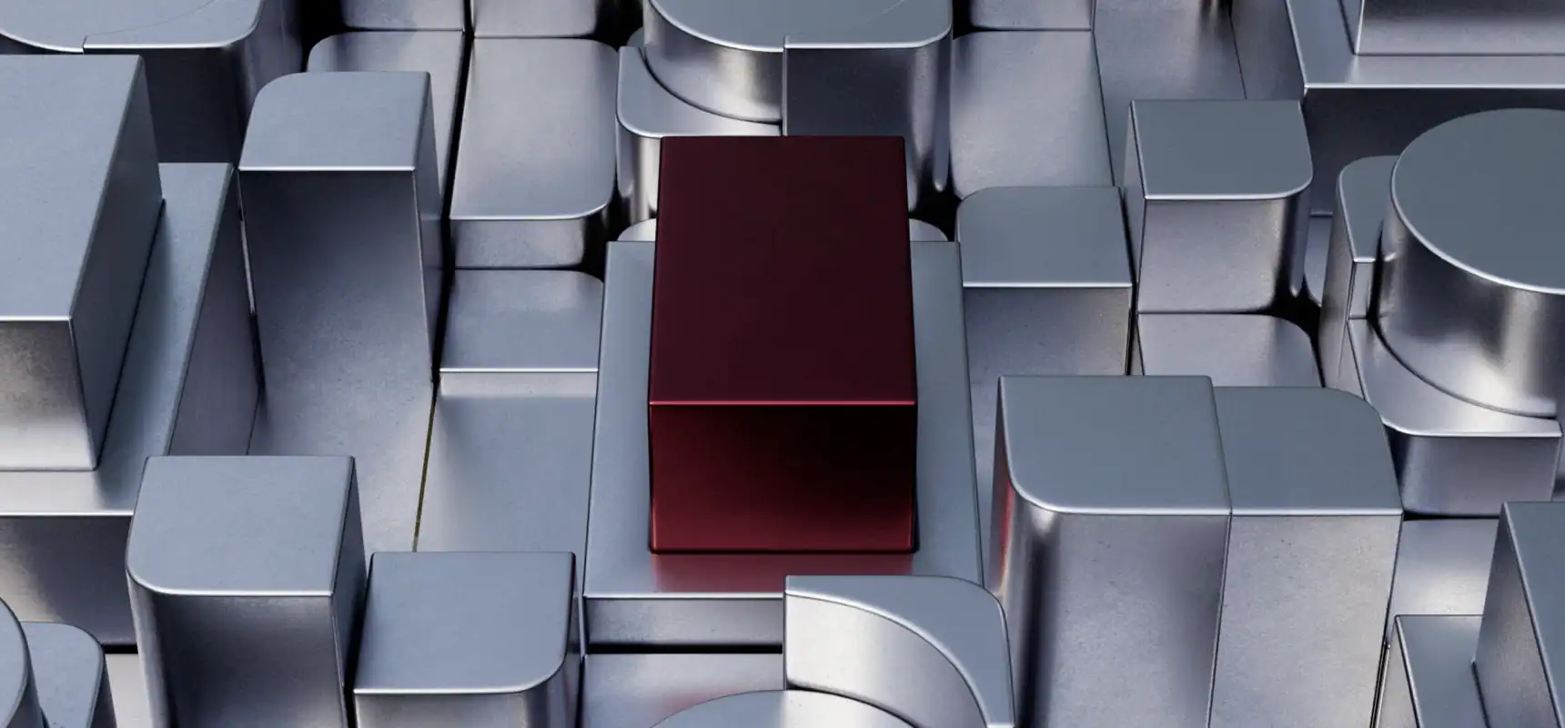 Modern metallic electrical components with a red central piece.